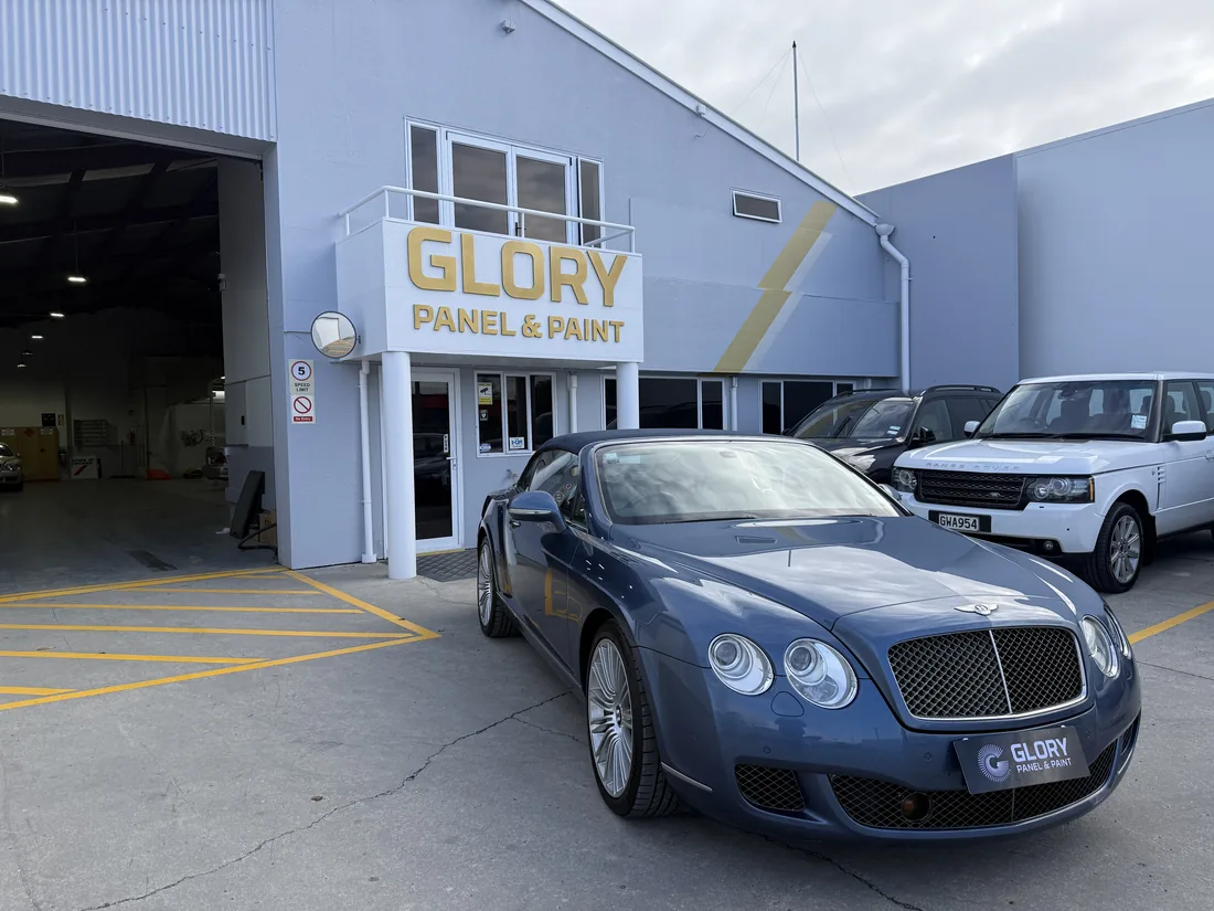 Blue Bentley Continental convertible at GLORY Panel & Paint, Christchurch