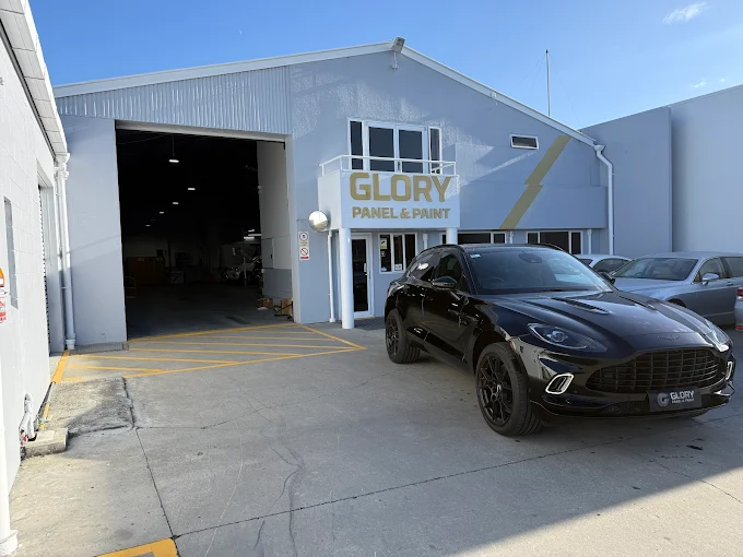 Aston Martin DBX at the GLORY Panel & Paint workshop bay, Christchurch